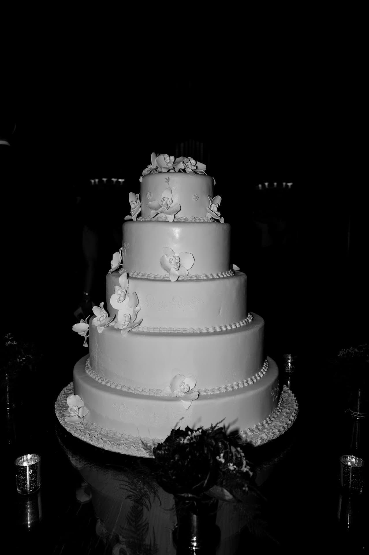 Five-tier wedding cake with orchids